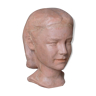 Head of a young woman in terracotta