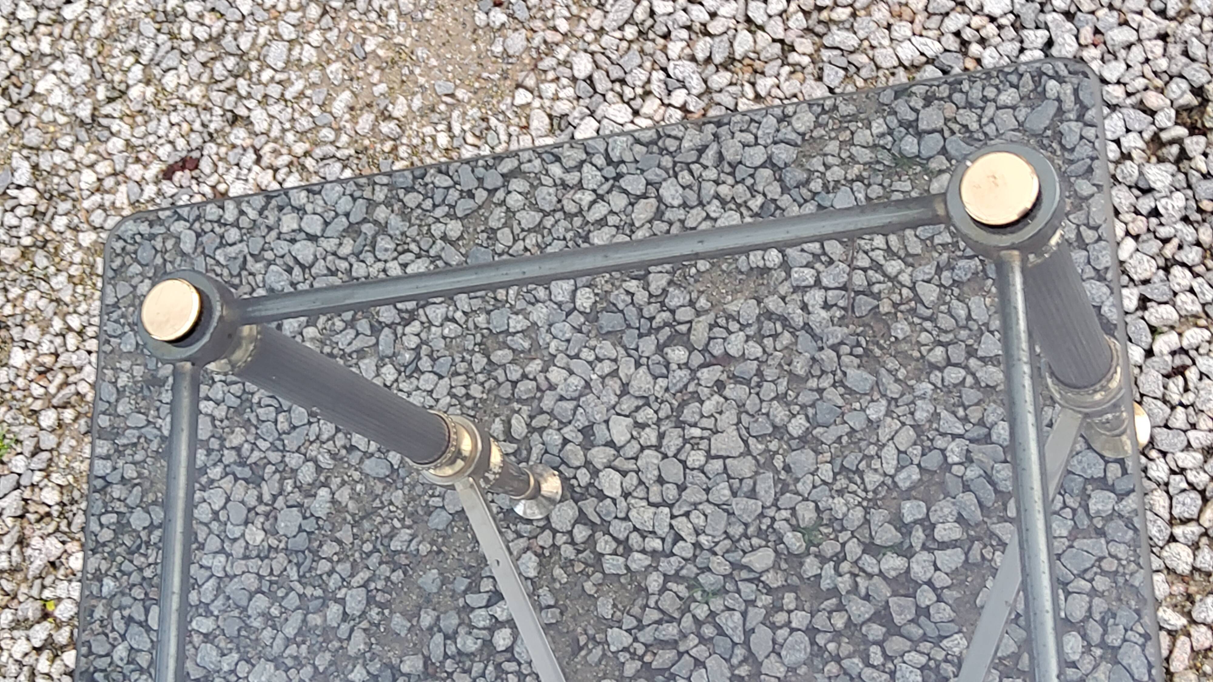 Coffee table of the 70s in neo-classical style gilded metal base and chrome smoked glass top