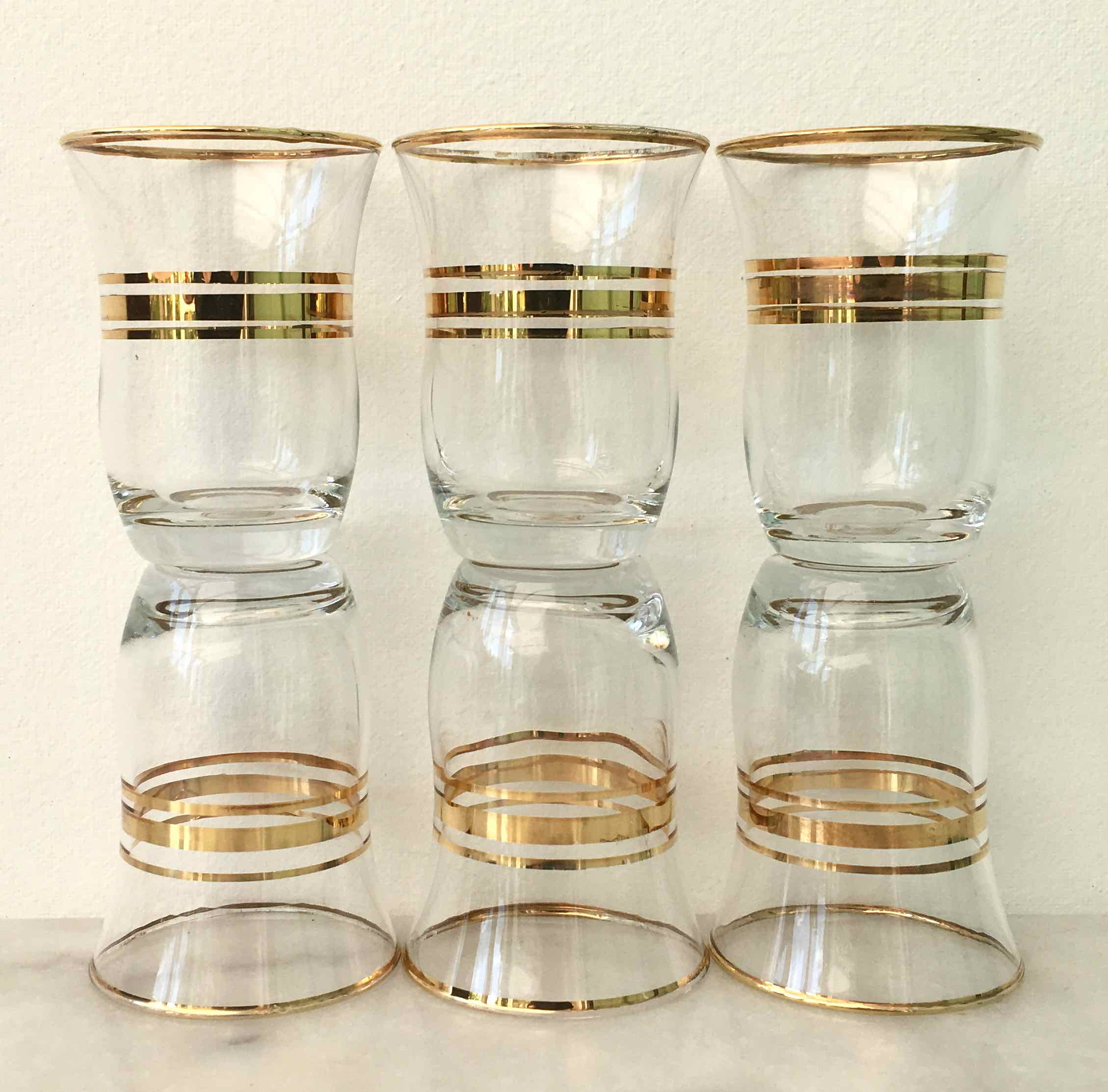 Six glasses of vintage alcohol cups
