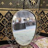Mirror signed Chaty Vallauris in gilded metal