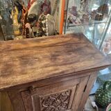 India. Bonnetière with a teak door finely carved by hand.