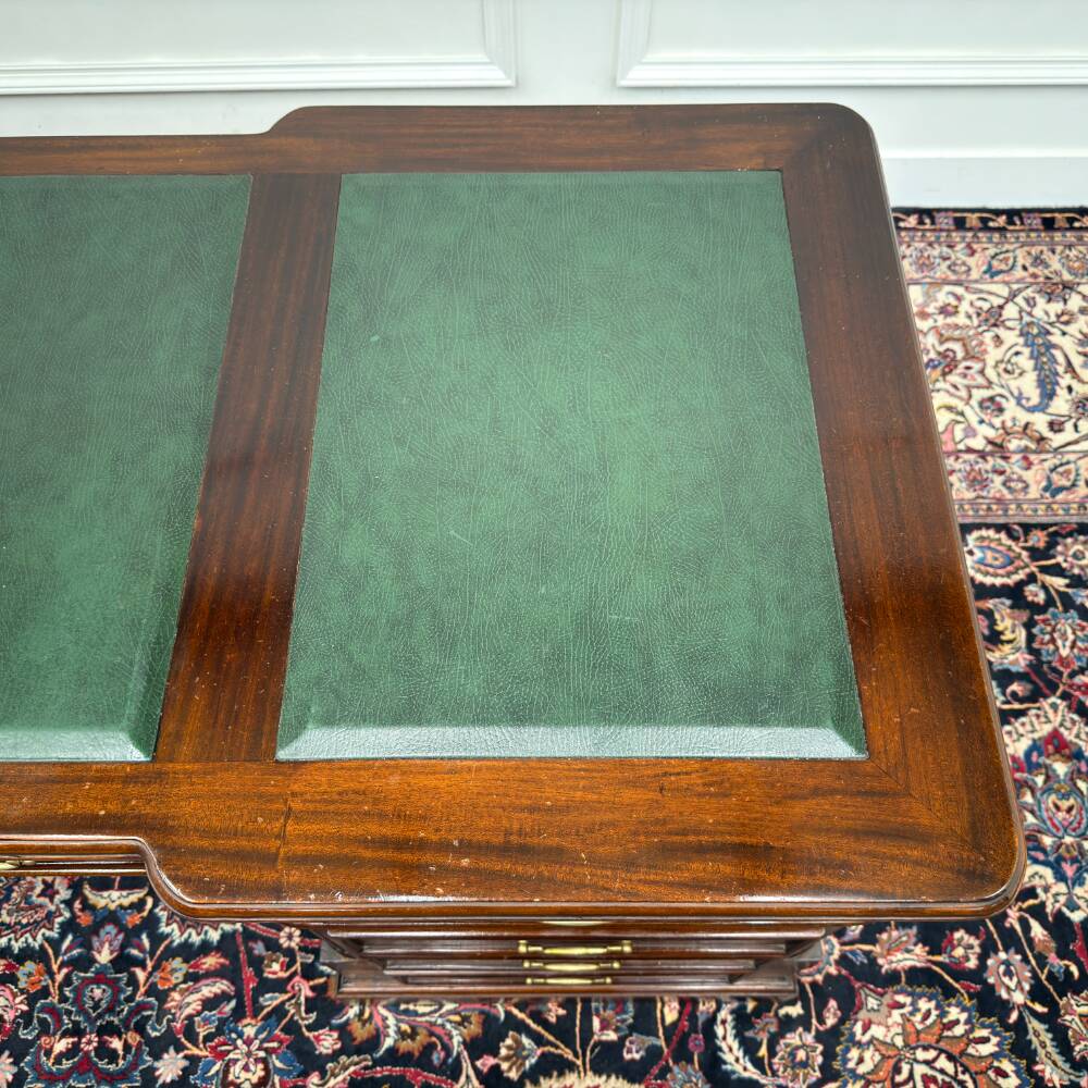 Classic English desk with green leather inlay.