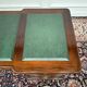 Classic English desk with green leather inlay.