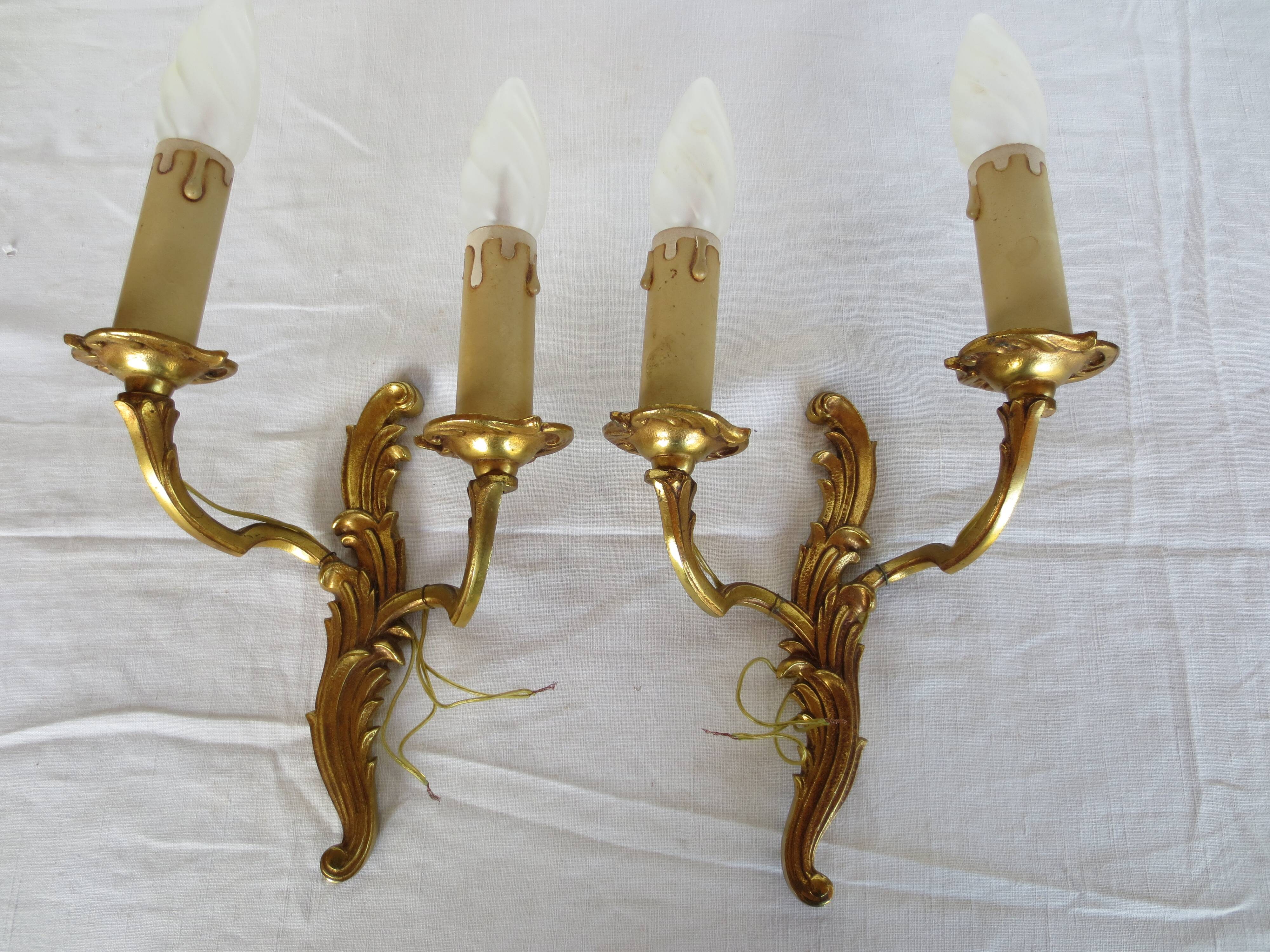 Pair of double wall lights in gilded bronze