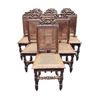 Set of 12 Louis XIII style chairs.