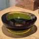 Large vintage Murano glass ashtray in olive green and amber.