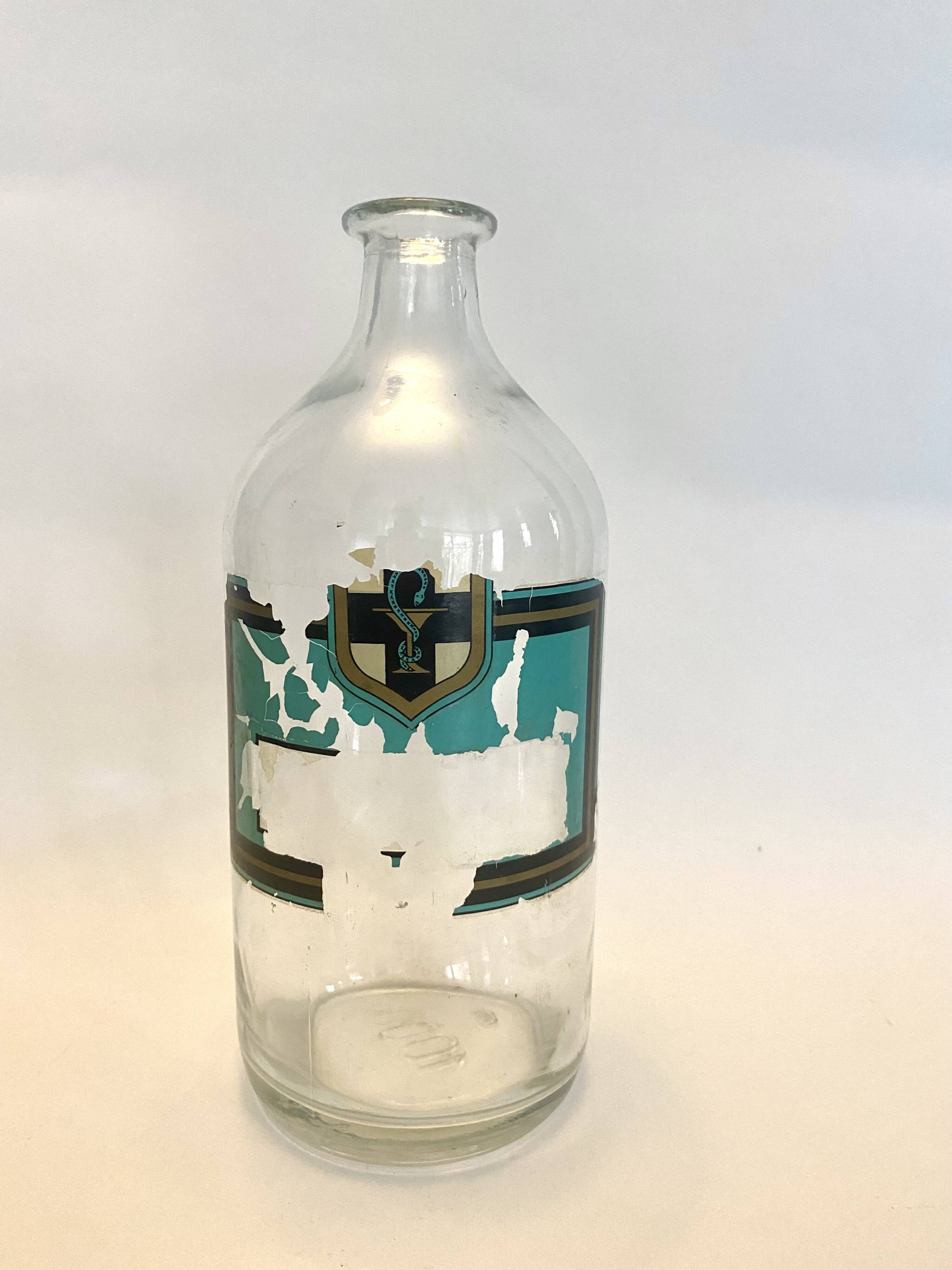 Pharmacy bottles 1900, glass and label