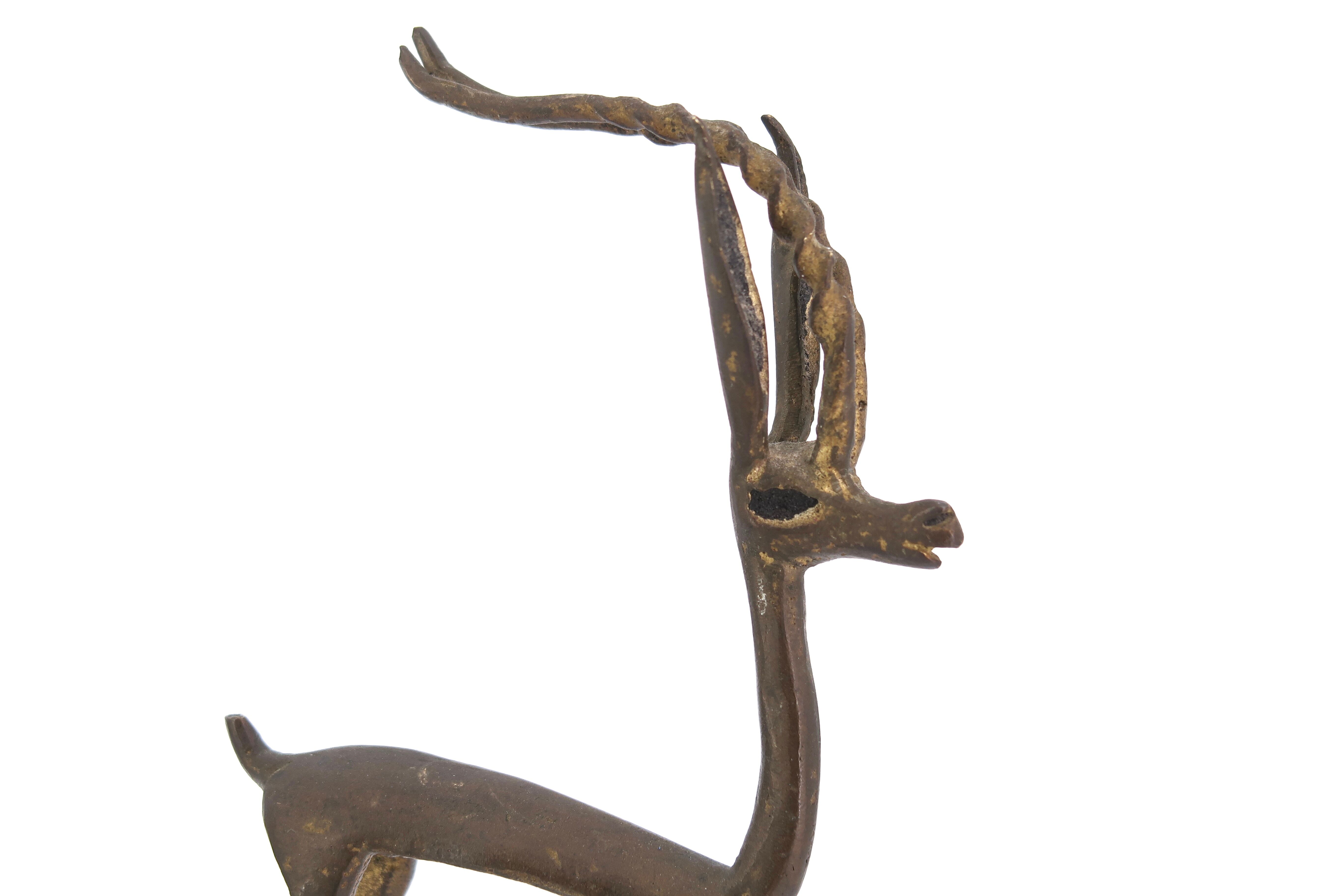 Pair of brass gazelles or antelopes, 50s