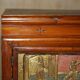 Antique Chinese armoire hand-carved around 1880 with country-style handles.