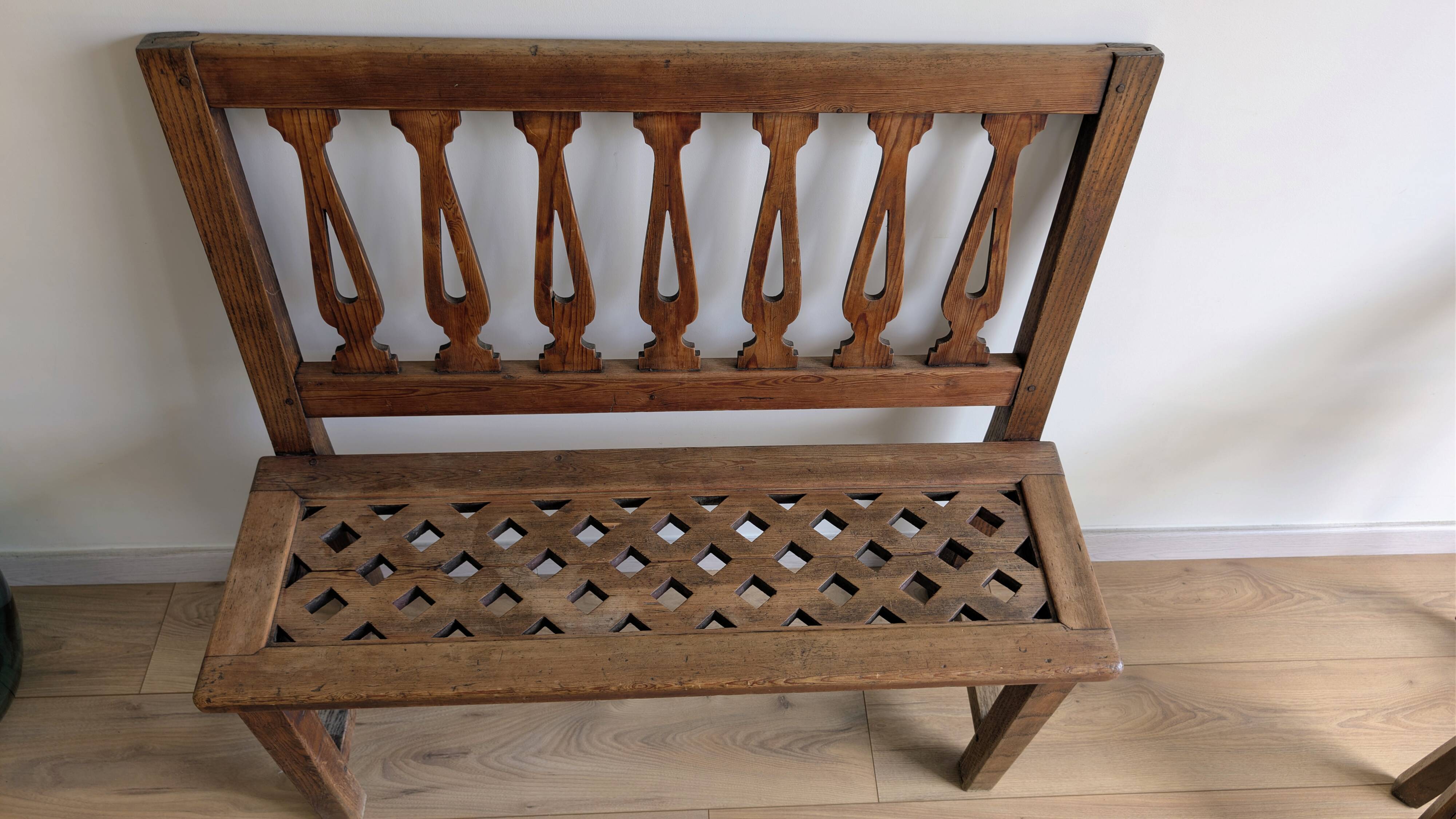Old church bench in pitch pine, rustic charm and authentic patina.
