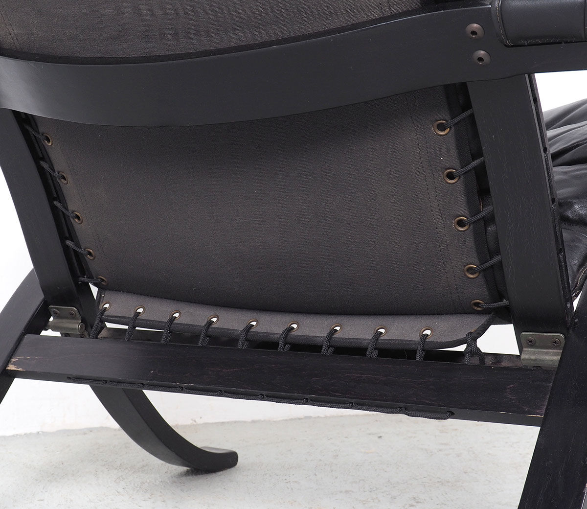 Westnofa black leather Flex armchair with ottoman