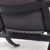 Westnofa black leather Flex armchair with ottoman