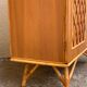 Rattan wardrobe with tapered legs from the 1960s.