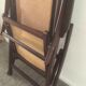 Folding wooden rocking chair and cannage from the 70s