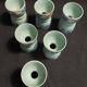 Antique painted wooden egg cups, set of six from the 1930s.