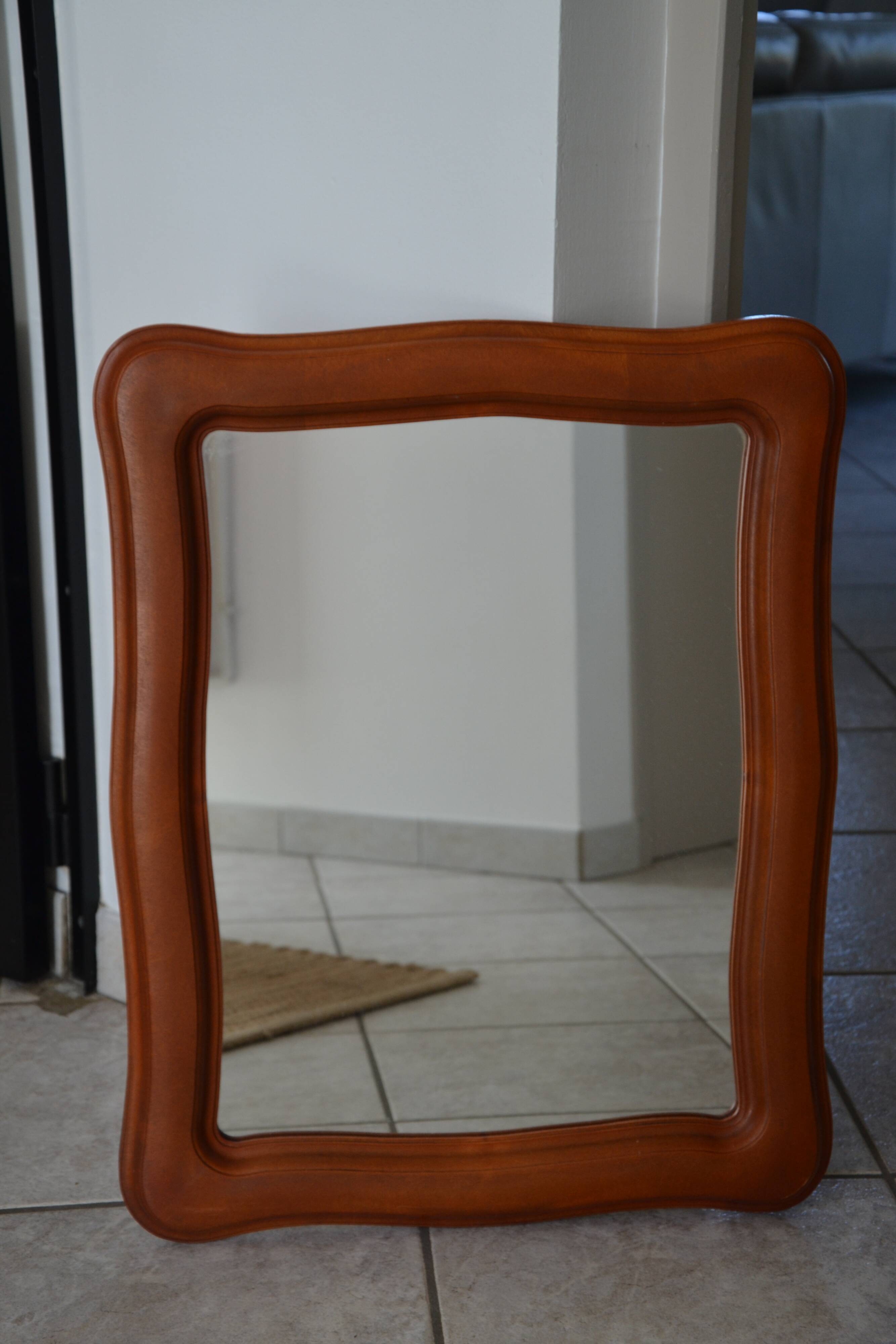 Vintage organic wavy cast resin mirror