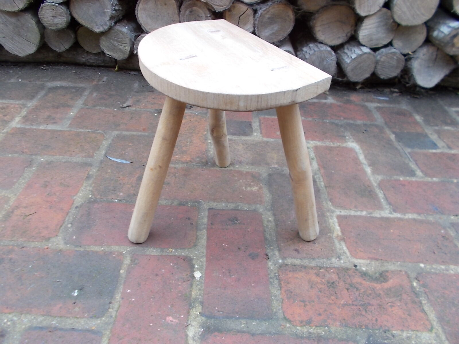 Raw wood tripod stool