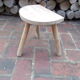 Raw wood tripod stool