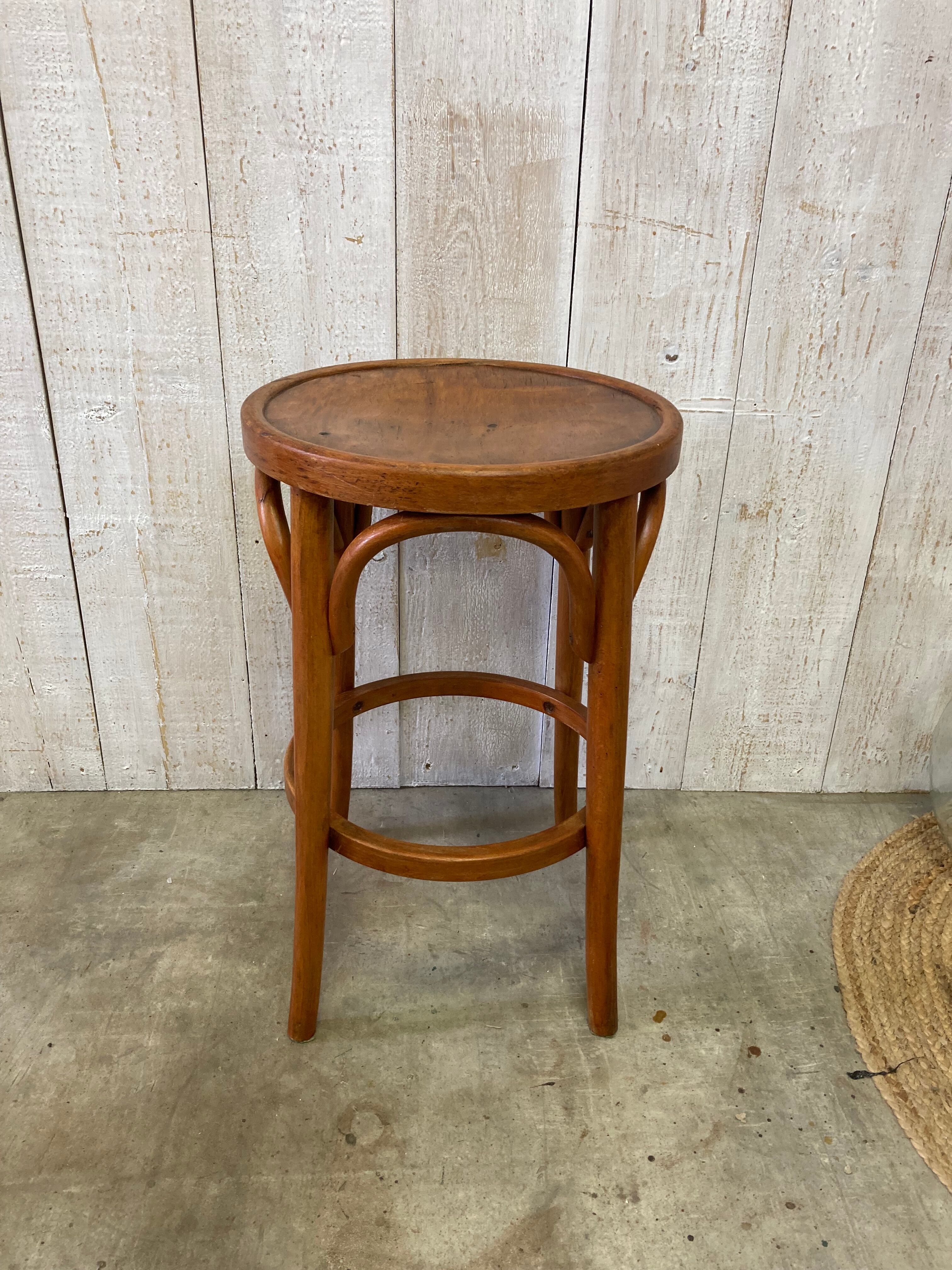 Curved wooden stool