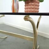 Smoked glass coffee table with gold-coloured legs from Sweden