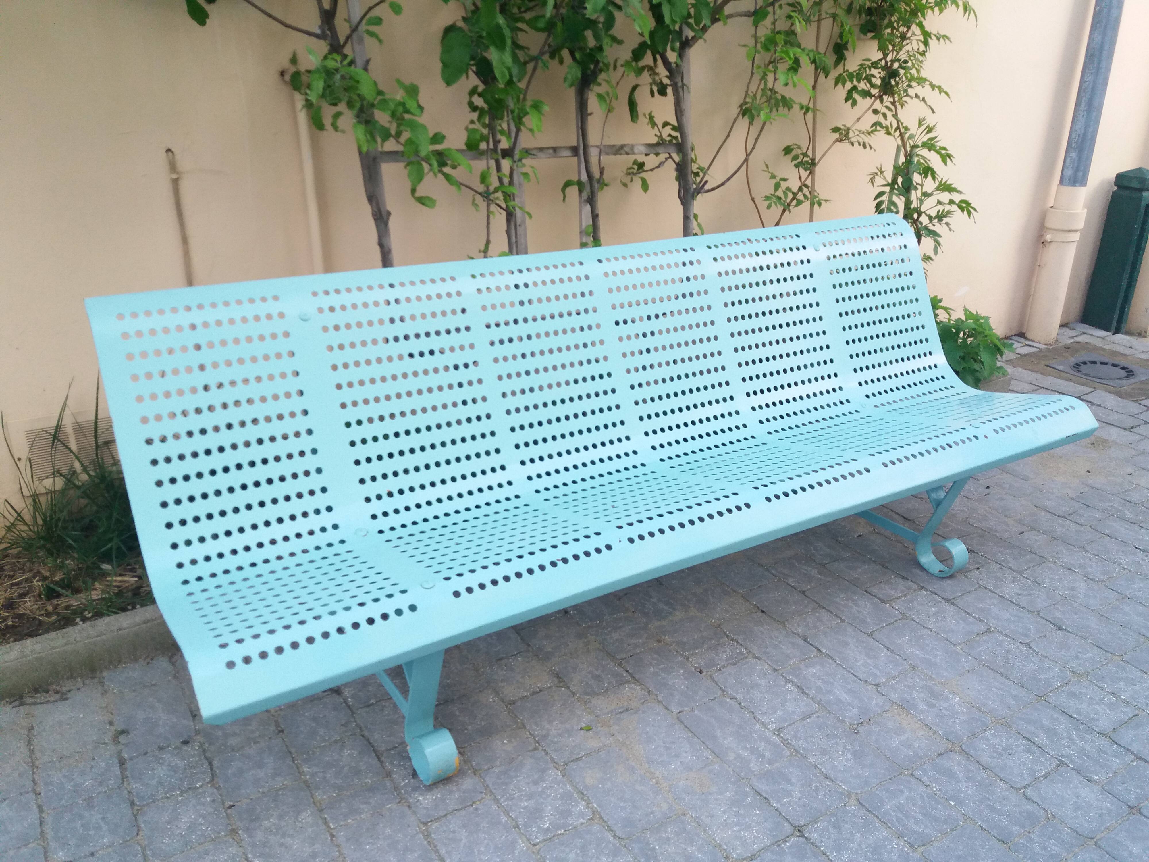 Vintage garden bench in metal
