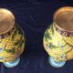 Pair of cloisonne enamel vases with japanese floral decor