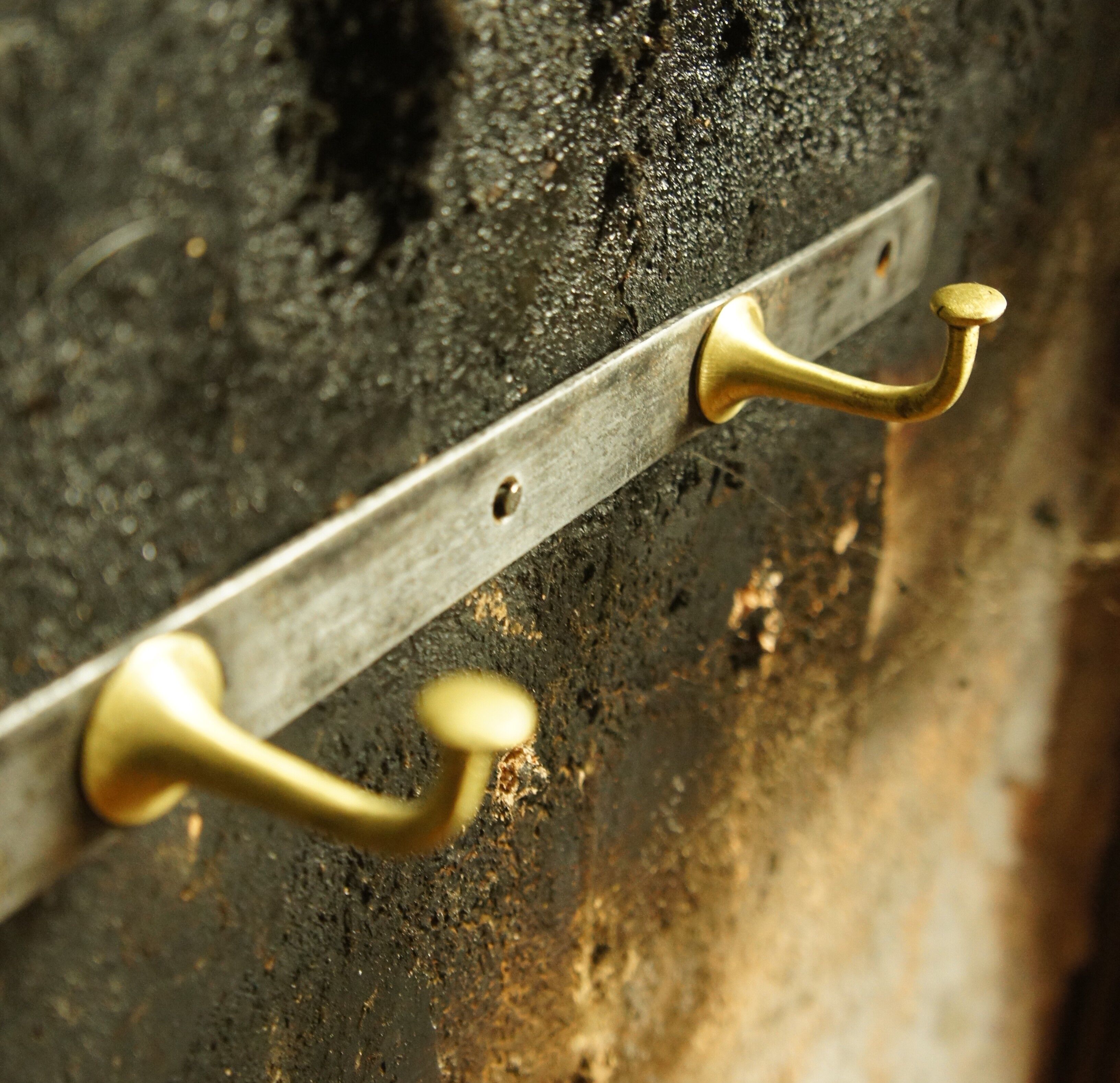 Golden bronze and black steel