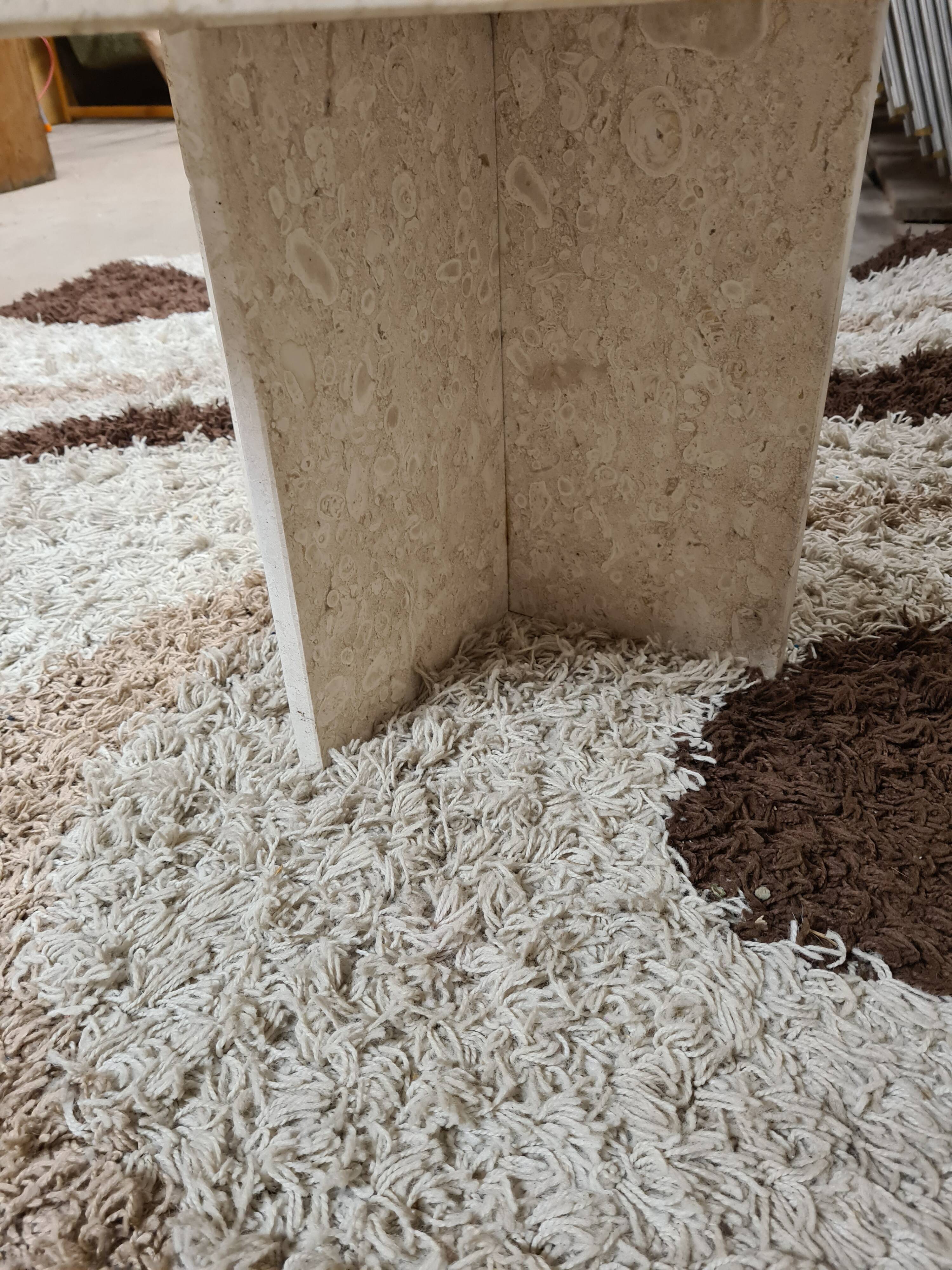 Travertine drop-shaped coffee table