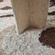 Travertine drop-shaped coffee table