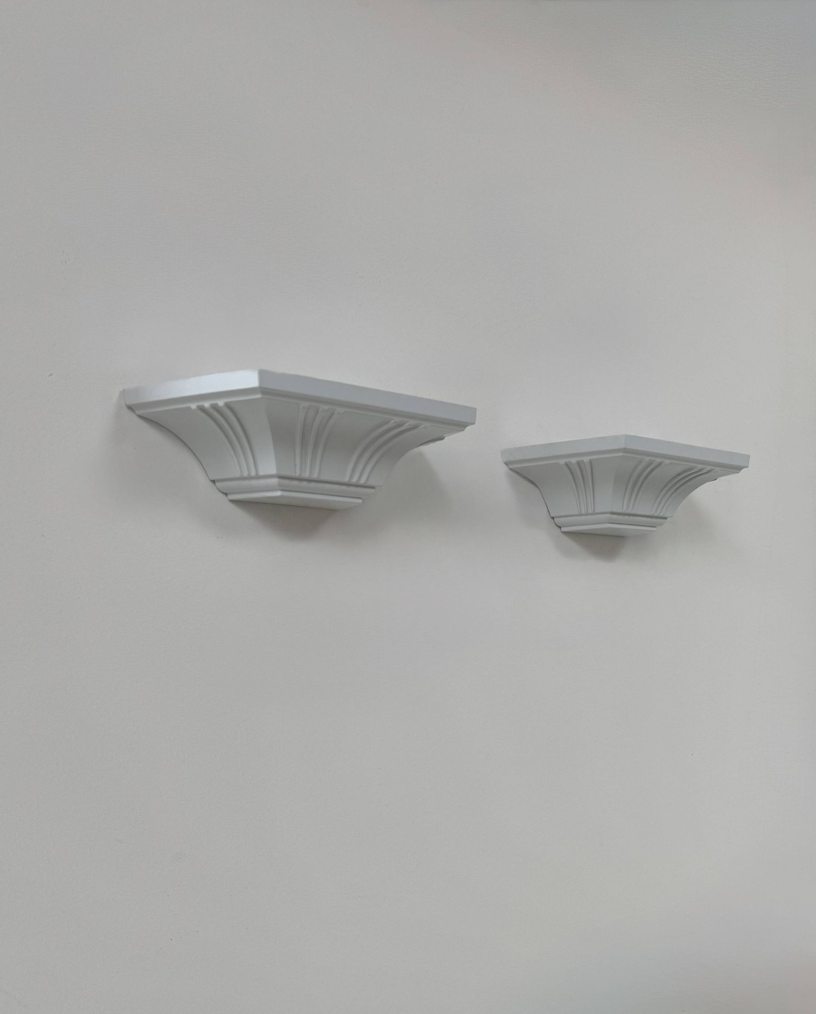 Pair of vintage wall lights, moulded pressed white matte ABS, France, 1980.