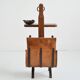 Vintage leather magazine rack with shelf and brutalist/rustic ashtray.