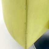 Yellow green space age bench with wavy design