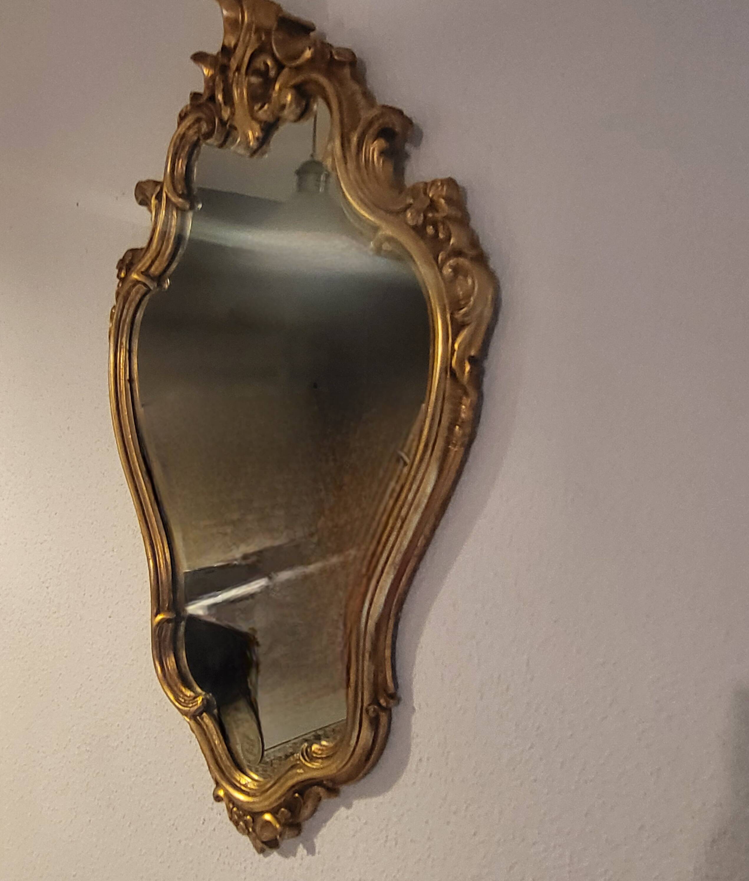 Miroir en bois d'or à  l or,style Louis 15