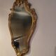 Miroir en bois d'or à  l or,style Louis 15