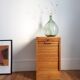 Low sliding curtain cabinet