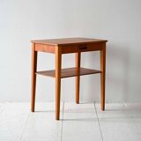 Scandinavian vintage teak nightstand with shelf and carved handle