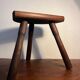 Tabouret tripode en bois