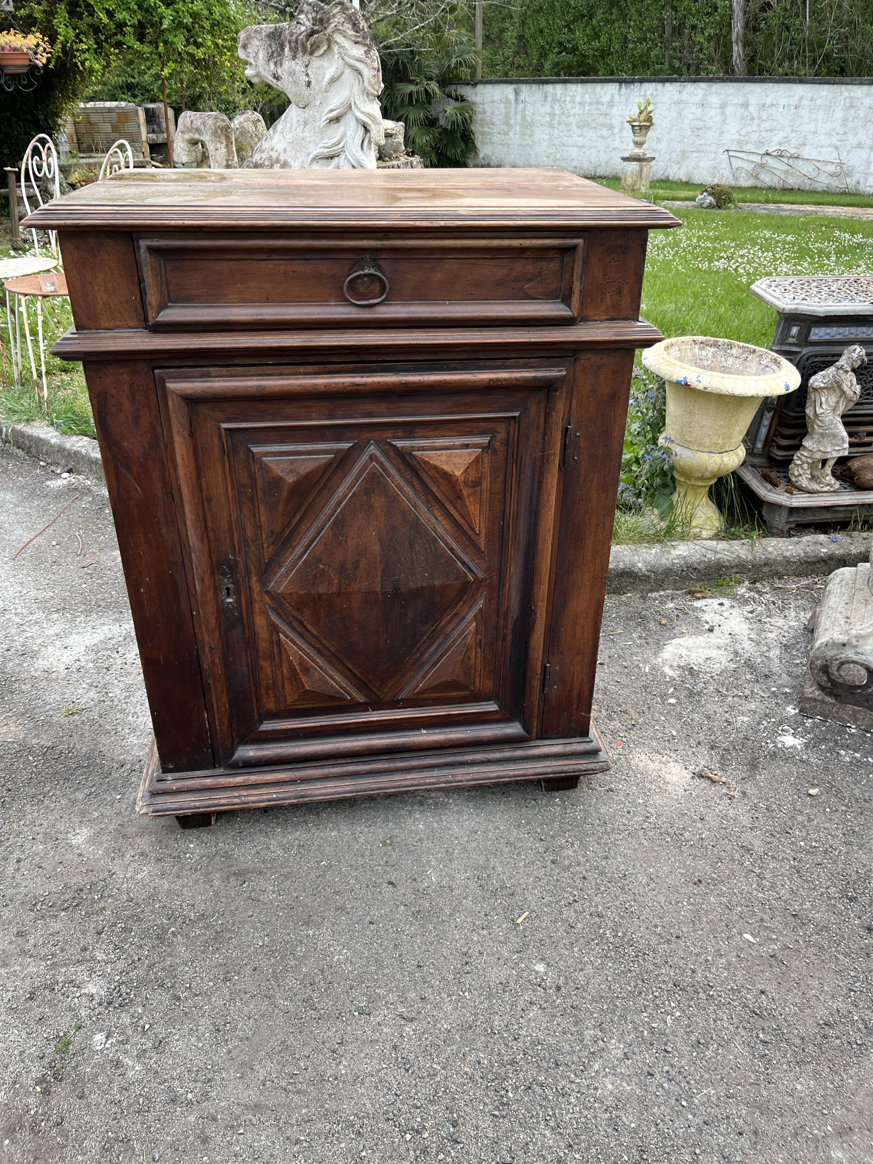 Antique walnut confiturier in Louis XIII style with diamond point panel.
