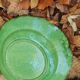 Hollow plate in green glazed clay Etienne Noël