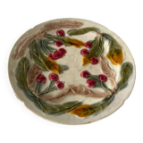 Old Barbotine plate decorated with cherries