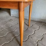 Extendable teak dining table