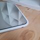 Arch mirror in white tubular steel frame from the 80s