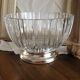 silver metal stand glass bowl