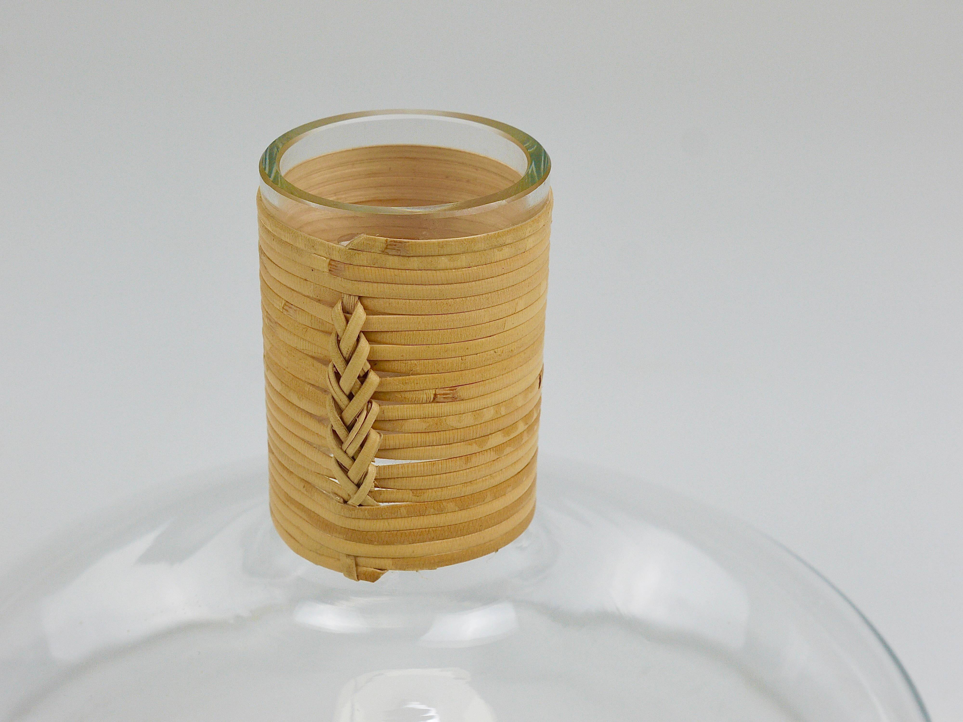 Vase by Carl Auböck decanter "Tuberkulinkolben" tall in rattan, Austria, 1950s.