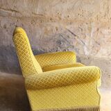 Mustard velvet fringed armchair