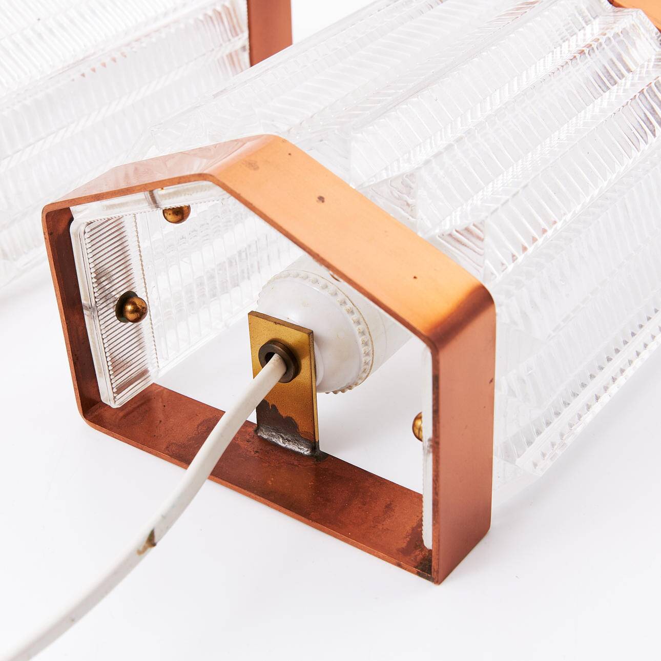 Scandinavian wall lights in copper and pressed glass