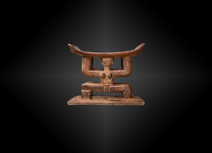Seat featuring a caryatid couple ashanti culture, ghana