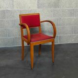 Small red bridge chair with armrests