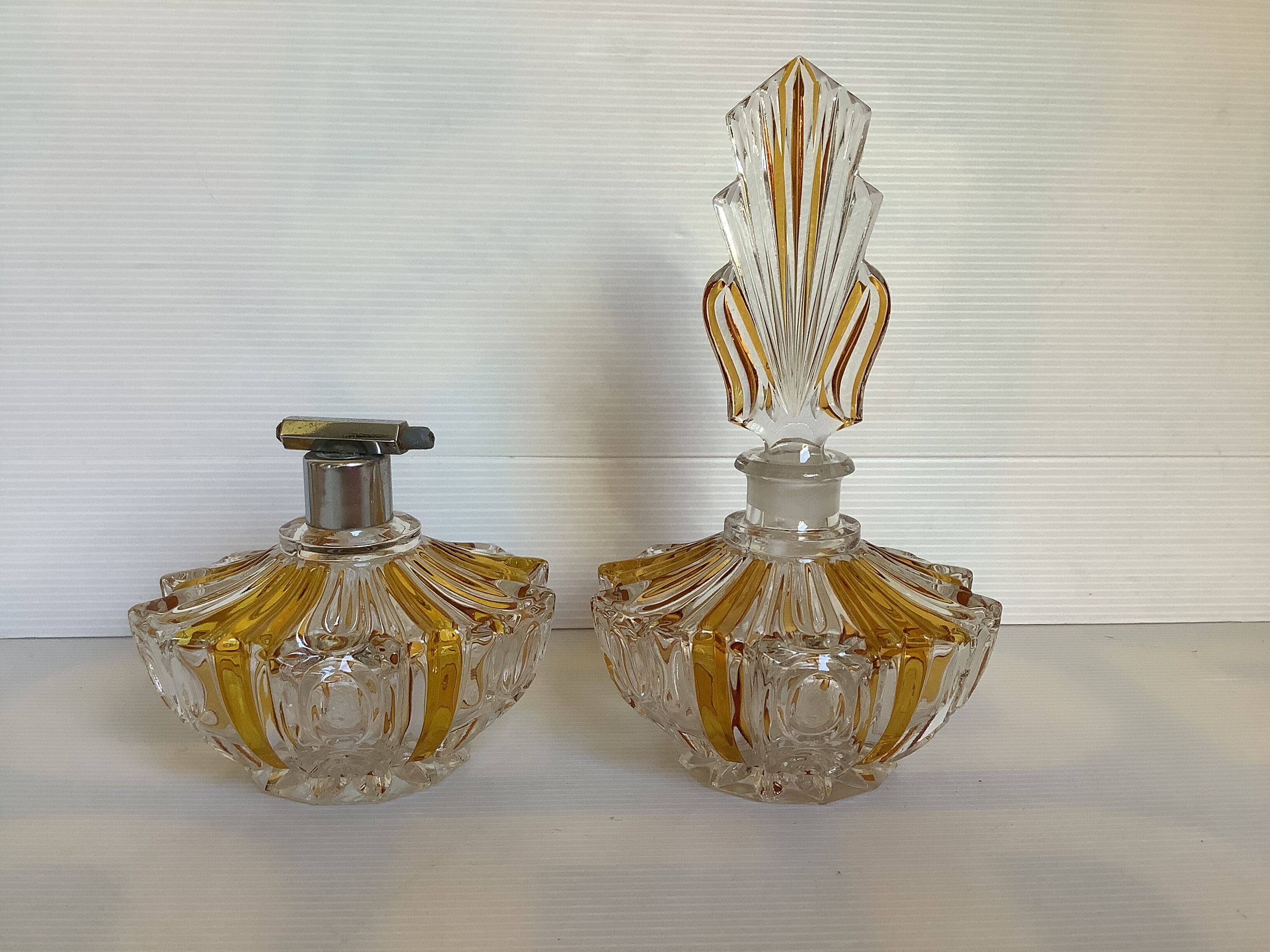 Perfume bottles and art deco spray