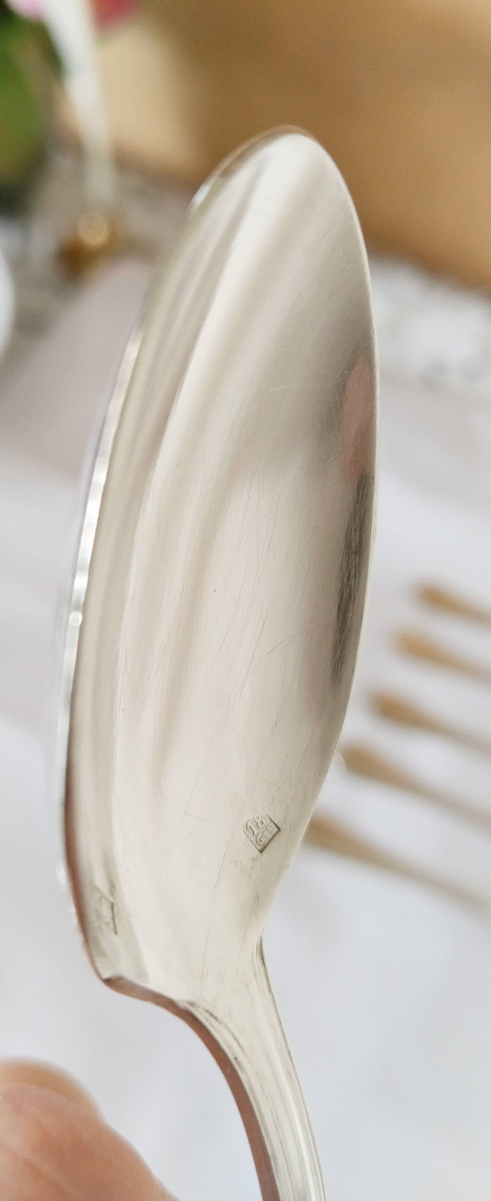 Dessert spoons, silver teaspoons